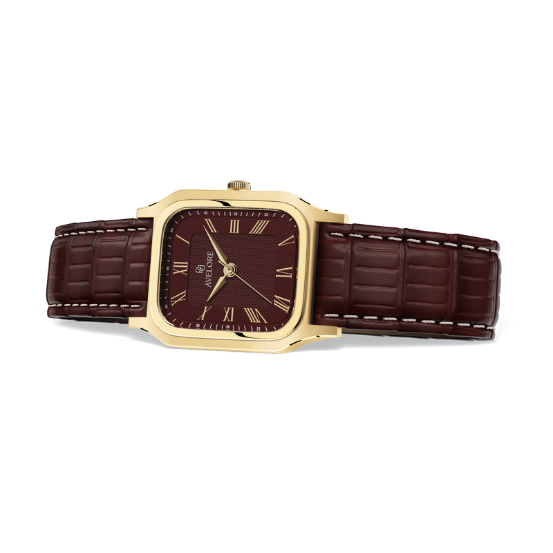 Gold square watch for women with burgundy dial and burgundy leather band. The model is Aima by Avelore.