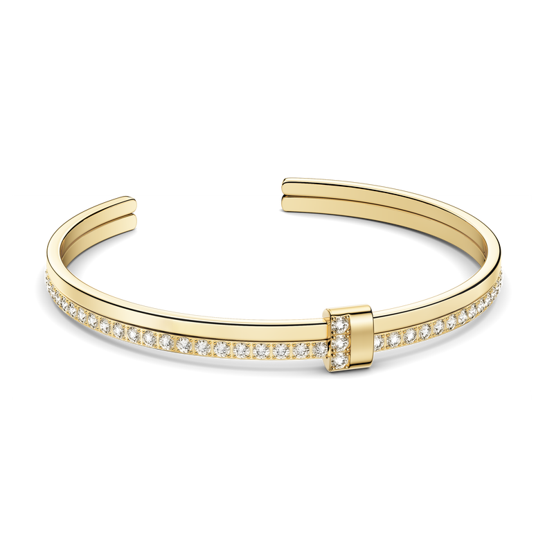 Gold bracelet with diamond accents on a white background. The model is Ame bangle by Avelore Women's Bracelets
