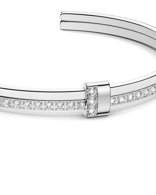 Silver bracelet with diamond accents on a white background. The model is Ame bangle by Avelore Women's Bracelets