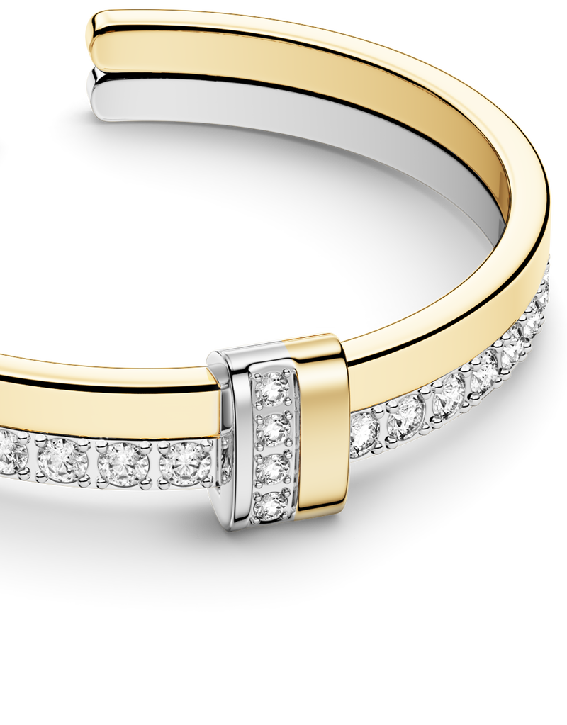 Gold and silver ring with stones. The model is Âme ring by Avelore.