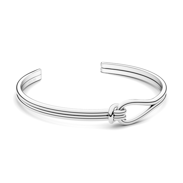 Silver bracelet with loop knot detail. The model is Coce bangle by Avelore Women's Bracelets