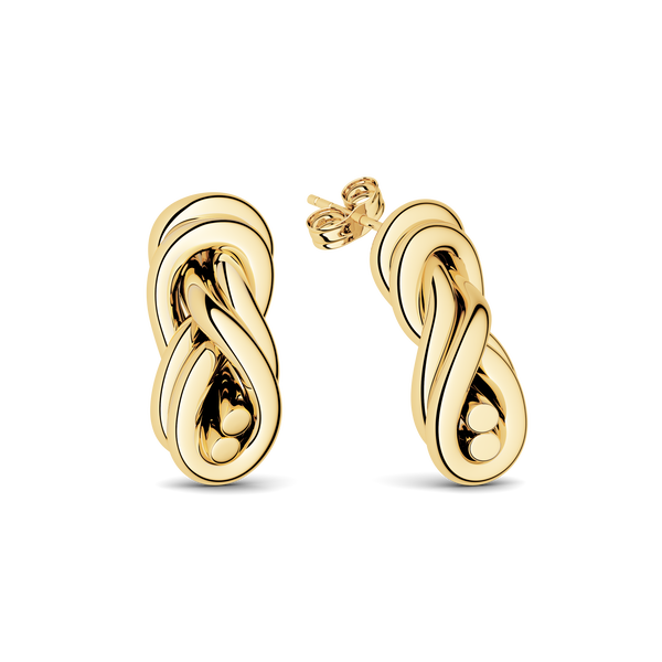 Pair of gold knot earrings. The model is Naia Earrings by Avelore. Women's earrings.