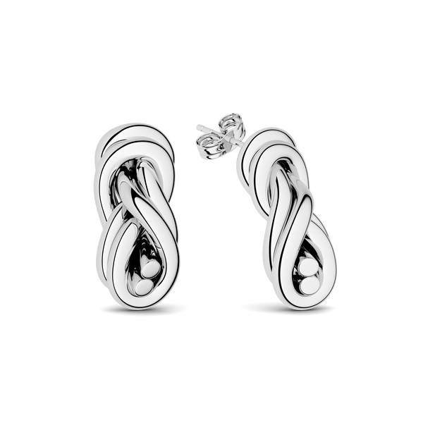 Pair of silver knot earrings. The model is Naia Earrings by Avelore. Women's earrings.