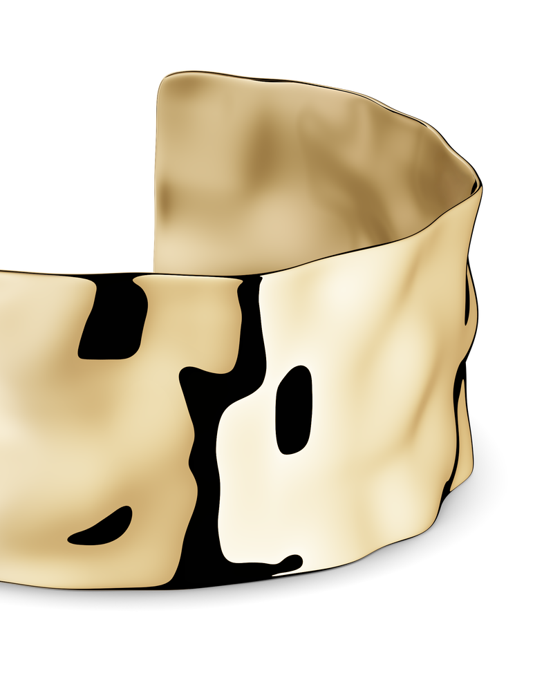 Wide gold cuff bracelet with hammered patterned surface. The model is Noem Bangle by Avelore  Women's Bracelets