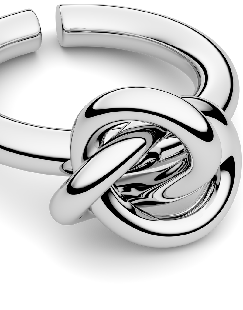 Silver knot ring by Avelore. The model is Veda Ring. Women's Rings.