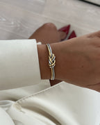 Naia Bangle by Avelore. Two-toned double knot bracelet for women. Onesize.