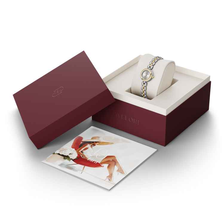 Two-tone round small watch for women with silver dial and silver and gold band. The model is Eira by Avelore.