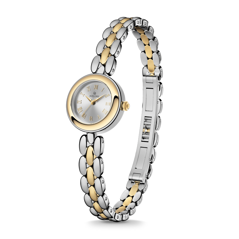 Two-tone round small watch for women with silver dial and silver and gold band. The model is Eira by Avelore.