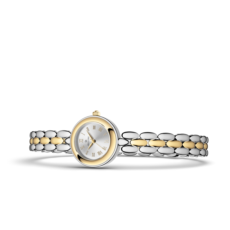 Two-tone round small watch for women with silver dial and silver and gold band. The model is Eira by Avelore.