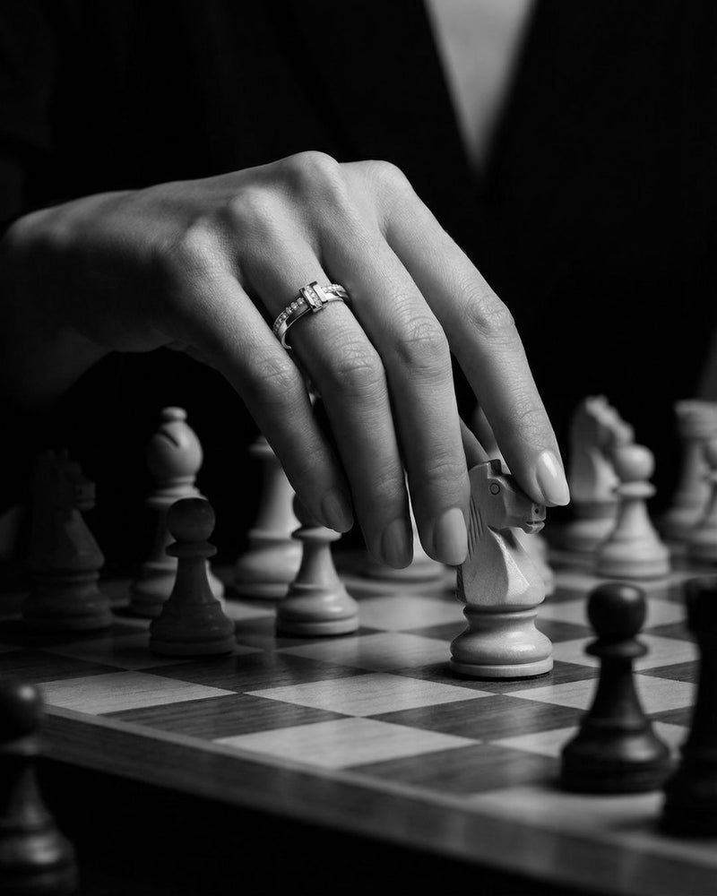 Gold and silver ring with stones. The model is Âme ring by Avelore.