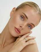 Gold and silver ring with stones. The model is Âme ring by Avelore.