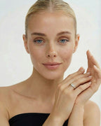 Gold and silver ring with stones. The model is Âme ring by Avelore.