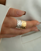 Bold wide cuff ring in gold with textured surface. The model is Noem Ring by Avelore Women's Rings